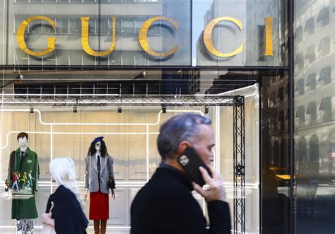 gucci mother company|Gucci .